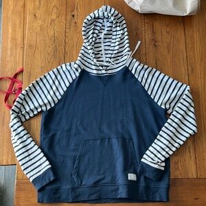 Orvis women’s hooded sweatshirt. Navy with striped sleeves & hood. Size medium.